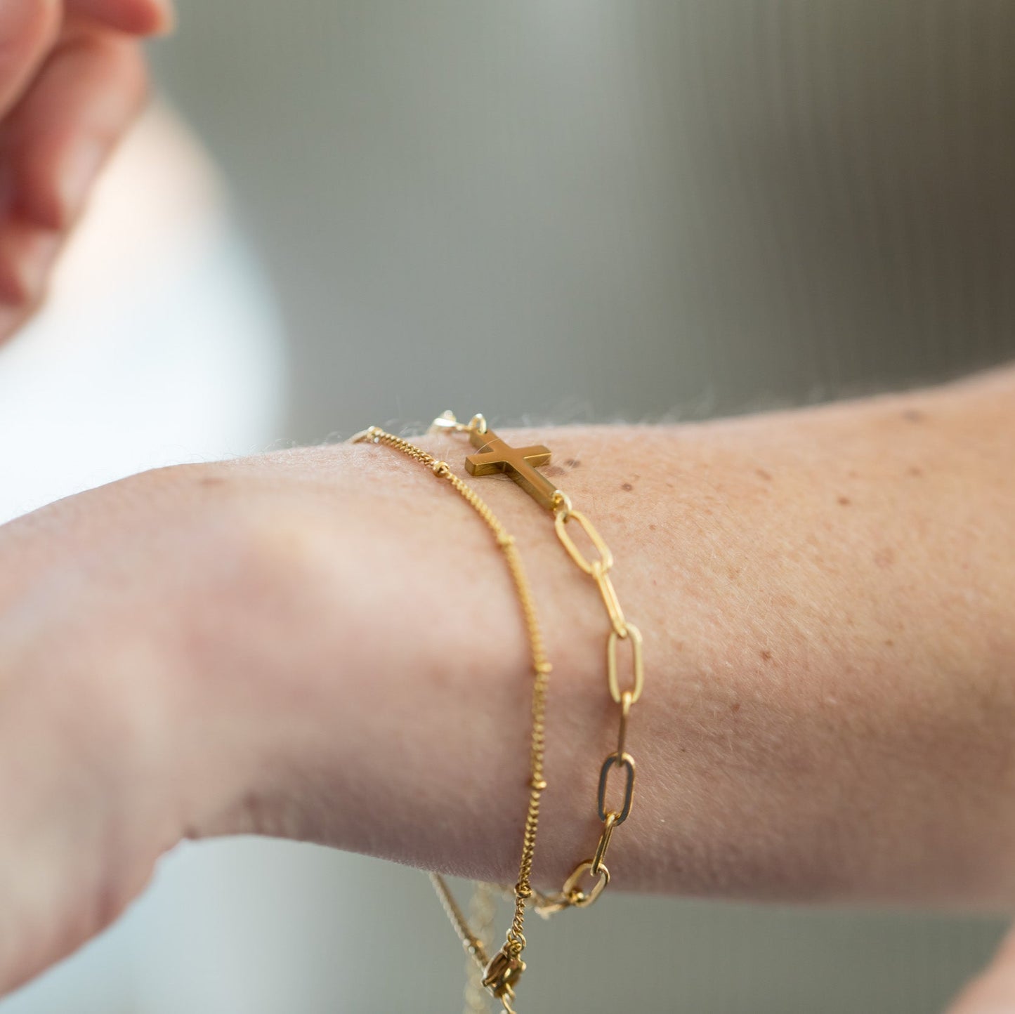 Double Strand Cross Bracelet