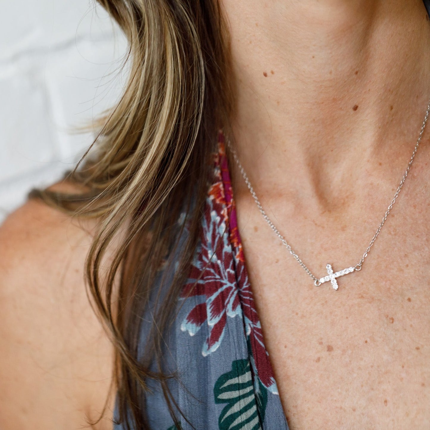 cubi zirconia cross on stainless steel chain front left view