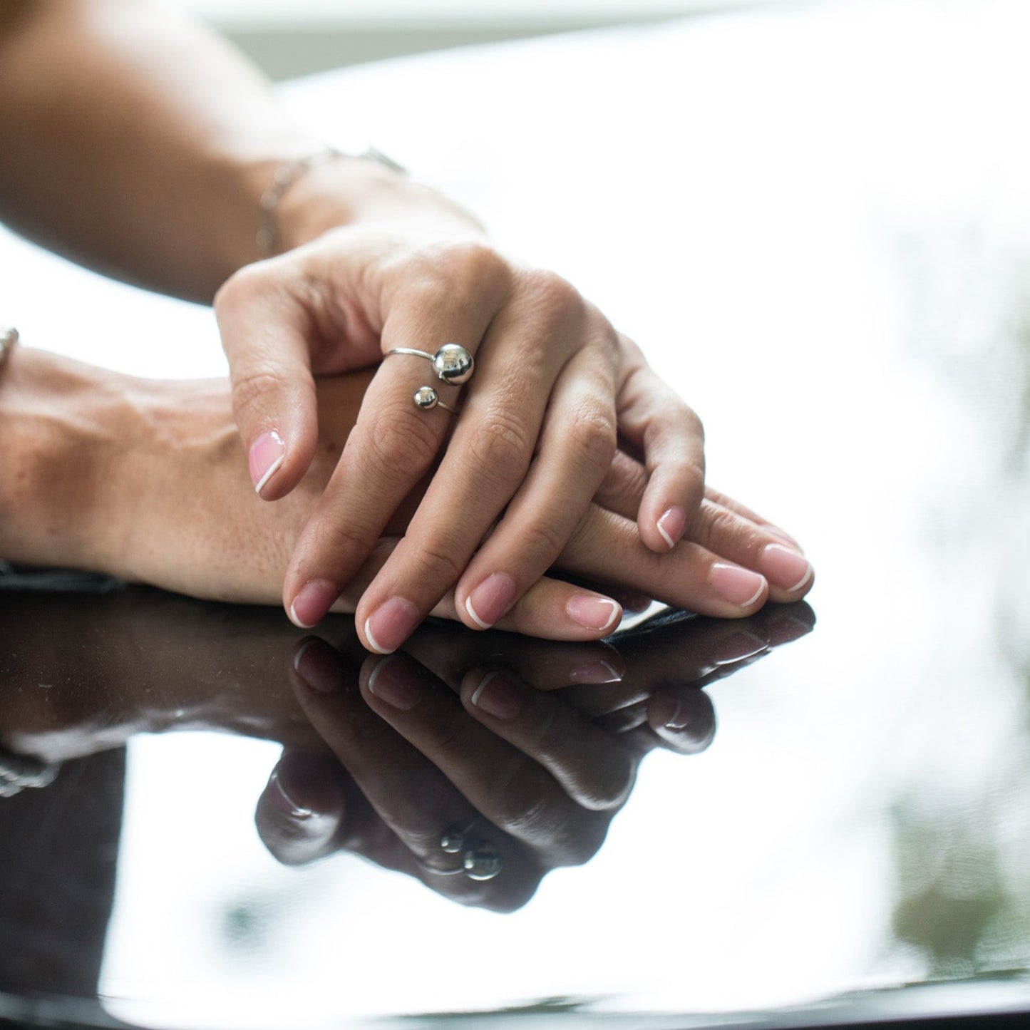 Silver adjustable ring with two beads