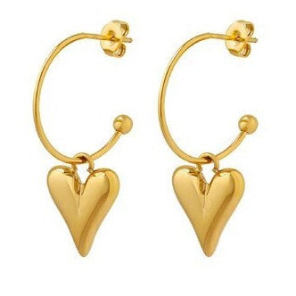 dangling heart earrings stock photo 