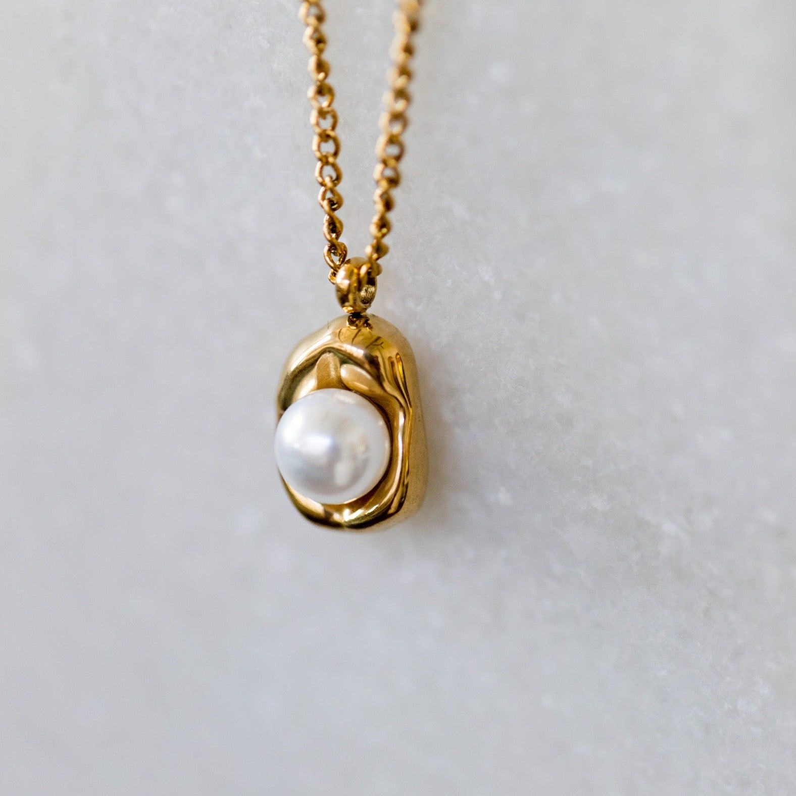 pearl gold necklace close up